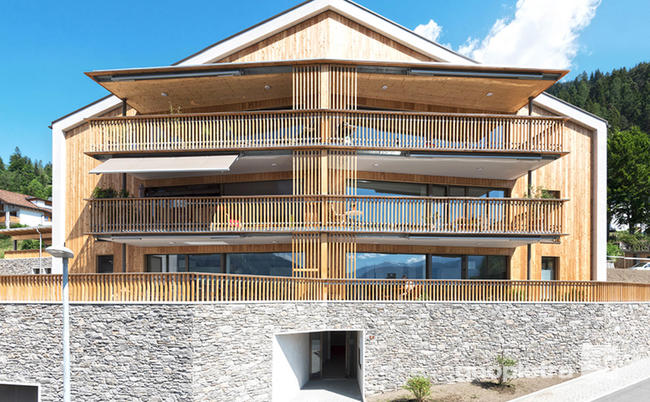 residence alpinstyle legno pietra balconi